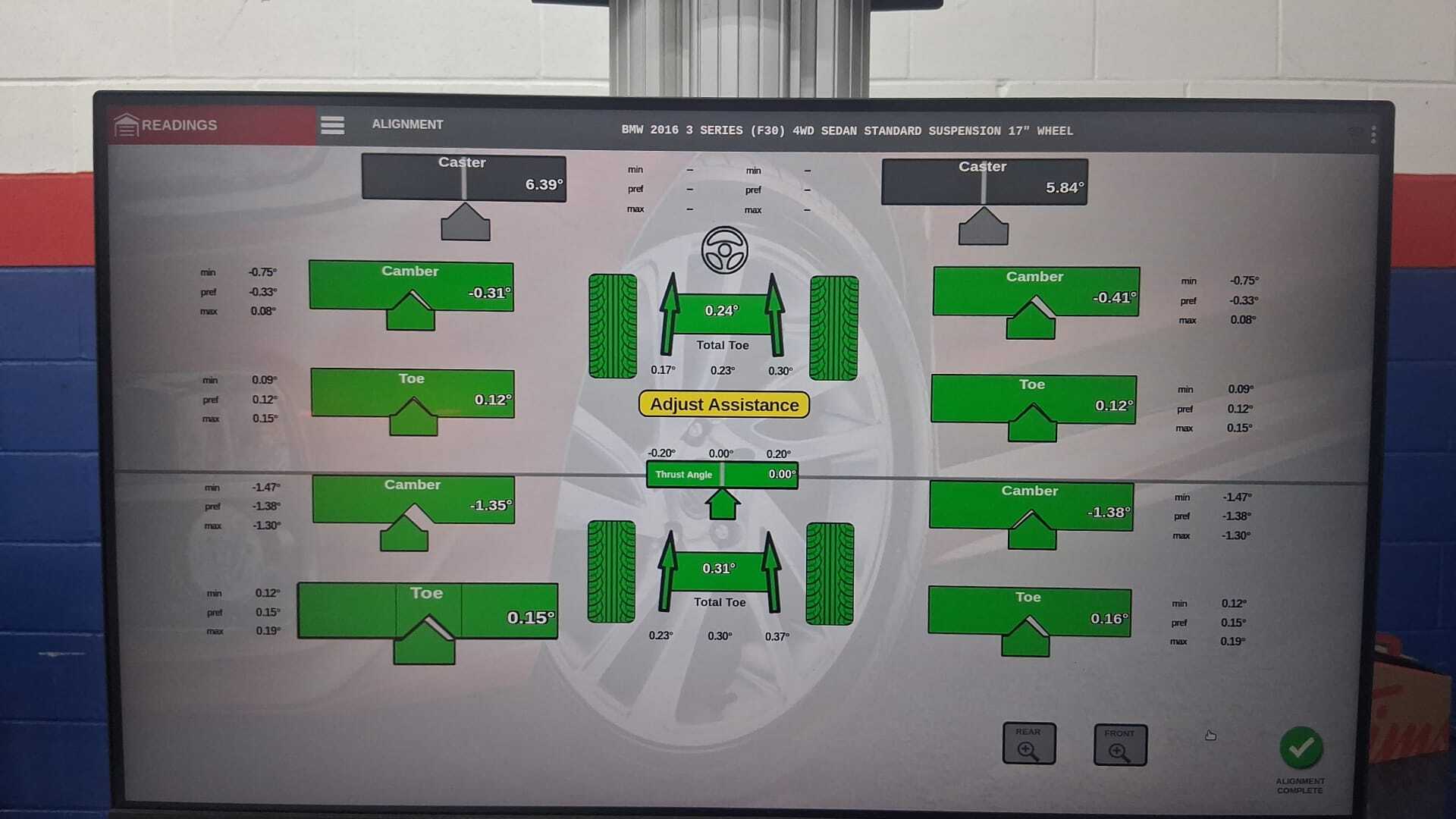 Actual alignment machine screen showing the wheel measurements after alignment